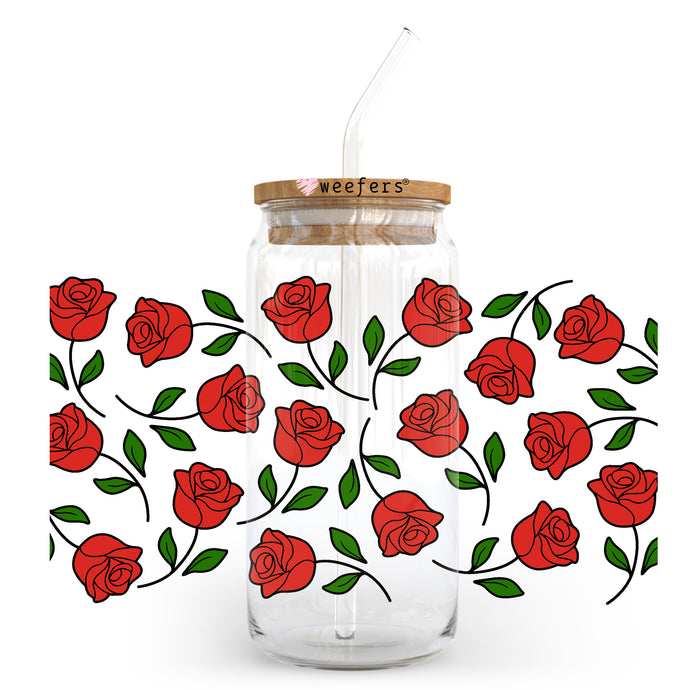 a glass jar with a straw in it with red roses on it