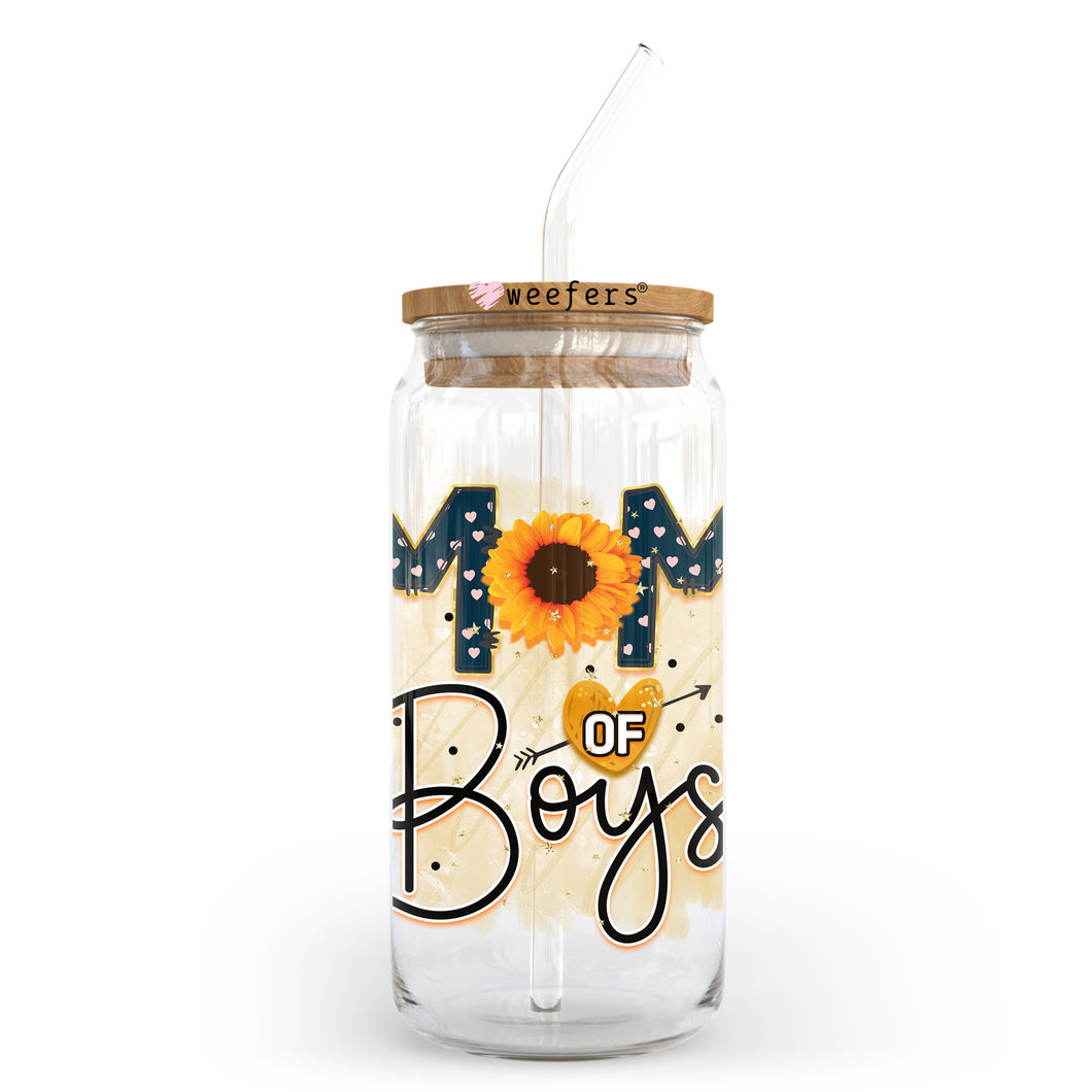 a mason jar with a straw in it that says mom of boys