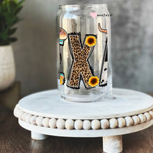 Load image into Gallery viewer, a glass with the letter k painted on it
