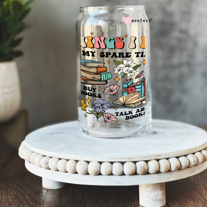 a glass jar with a picture of books on it