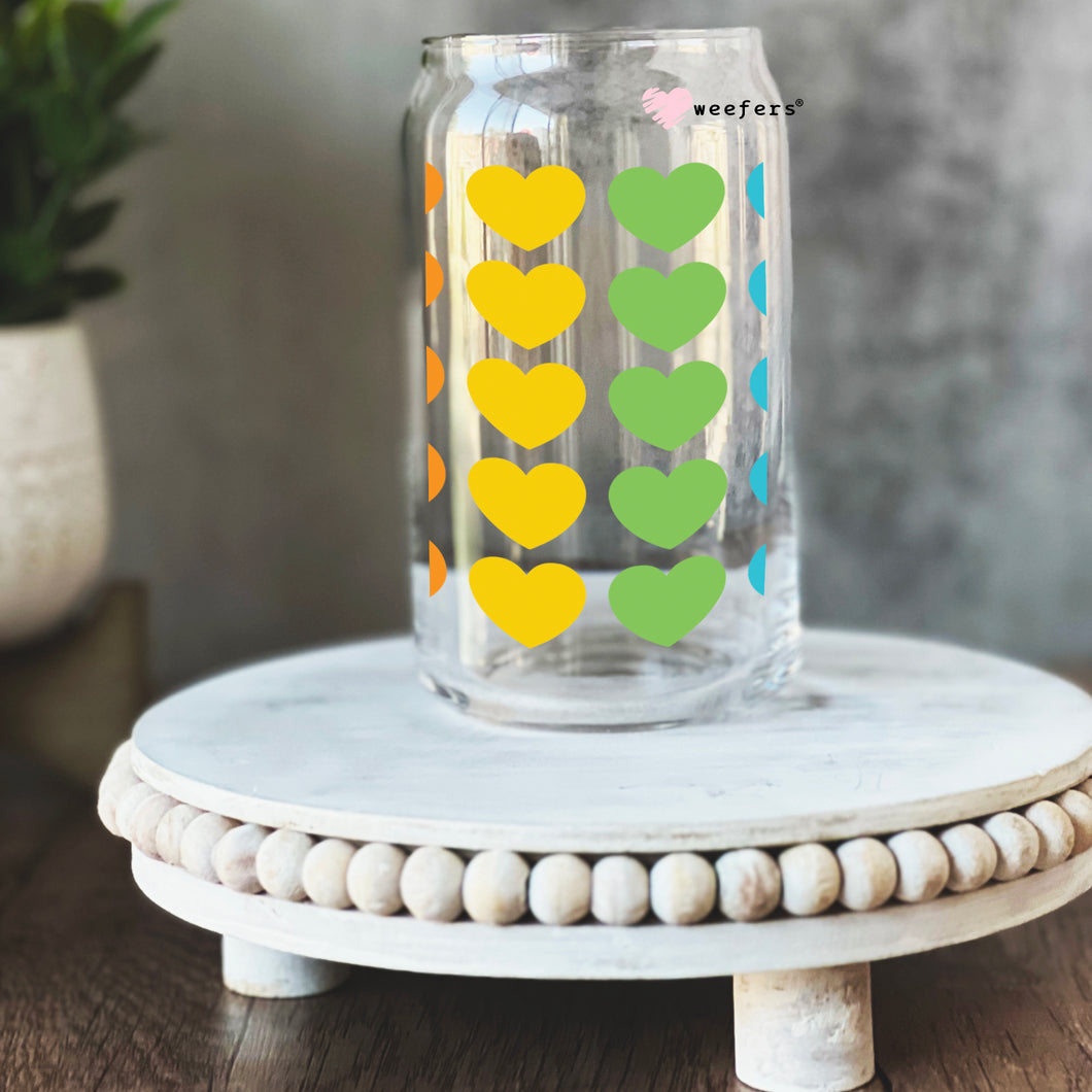 a mason jar with hearts painted on it