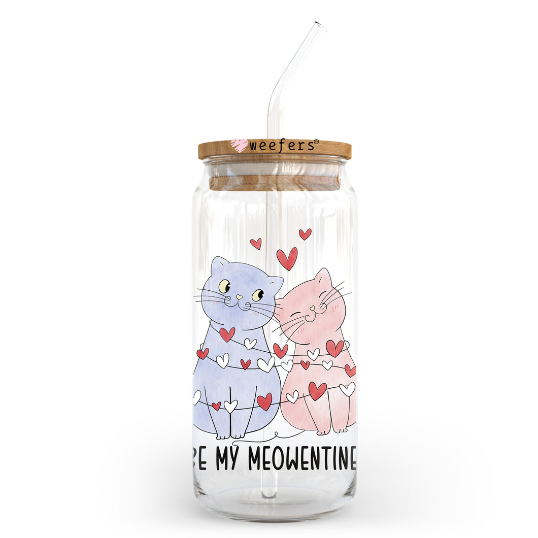 a glass jar with two cats on it