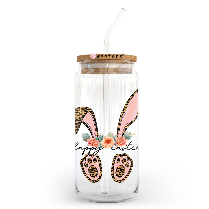 a glass jar with a straw in the shape of a bunny ears