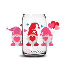 Load image into Gallery viewer, a glass jar filled with hearts and gnomes

