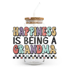 Load image into Gallery viewer, a jar with a straw in it that says happiness is being a grandma
