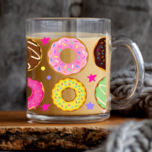 Load image into Gallery viewer, a cup of coffee with donuts painted on it
