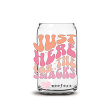 Load image into Gallery viewer, a glass jar with a pink and orange design on it
