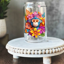 Load image into Gallery viewer, a glass jar with a monkey and flowers on it
