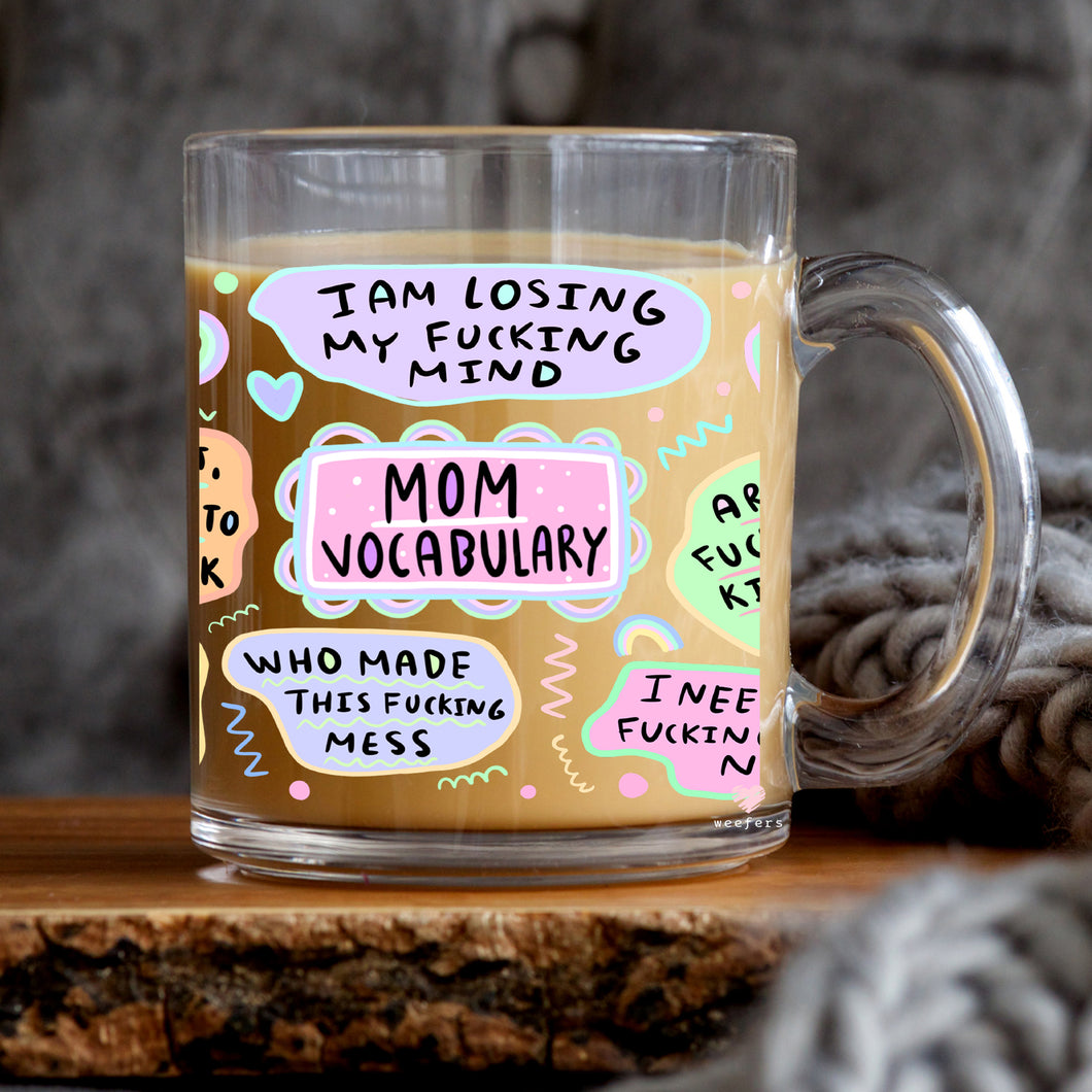 a glass mug with a message on it