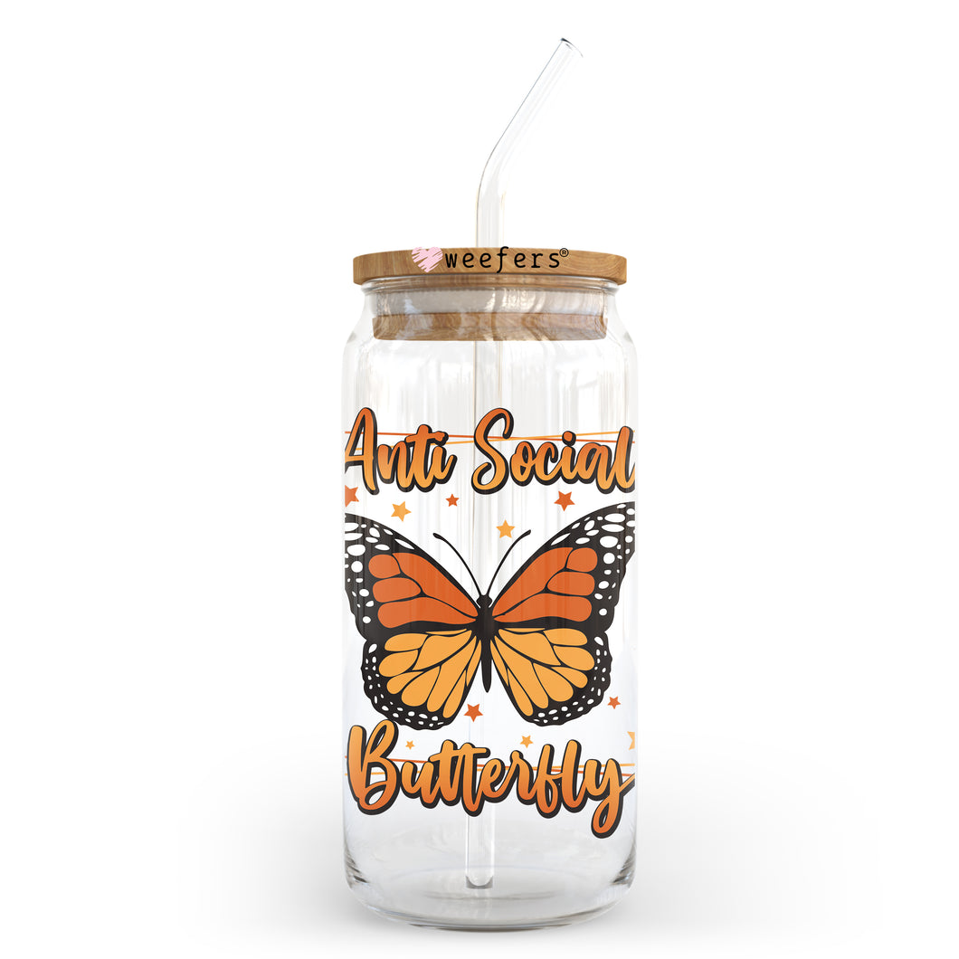 a glass jar with a butterfly on it