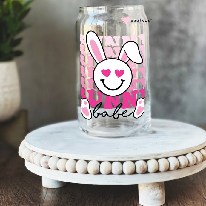 a glass jar with a pink bunny face on it