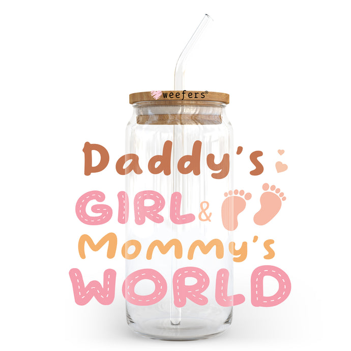 a glass jar with a straw in it that says daddy's girl and mommy